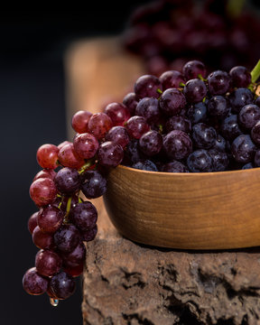 Red Grapes In The Wooden Bowl