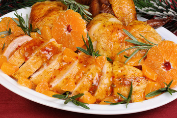Baked chicken in tangerine sauce