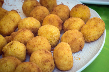 Sicilian rotisserie. Arancine