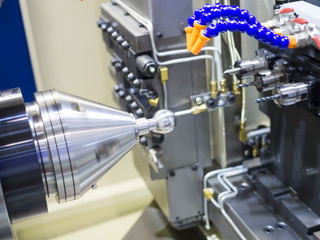 Operator machining automotive part
