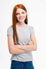 Obraz premium Attractive smiling woman posing with folded hands