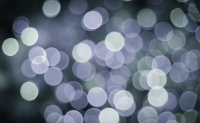 Defocused blur dark green bokeh of festival light on Christmas a