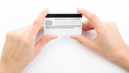 Close up of hand holding credit card