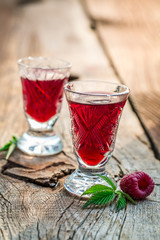 Sweet liqueur with alcohol and raspberries