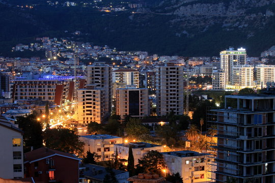 City in mountains in the evening, kind from above.