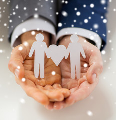 close up of happy male gay couple with love symbol