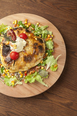closed pizza with vegetables