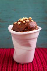 chocolate cake in a white cup