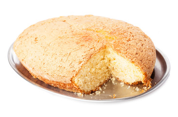 one piece of sponge cake isolated on a white background
