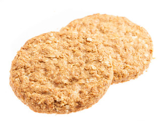 two biscuit of oats on a white background