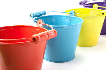 Colorful small bucket on white background