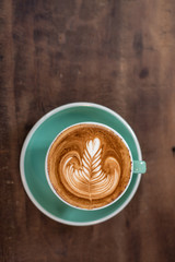 hot coffee on wooden table