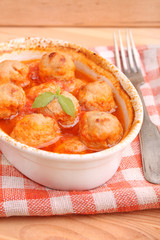 meat balls in tomato sauce in Italian