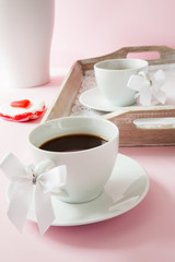 Coffee cups with ribbon on the handle