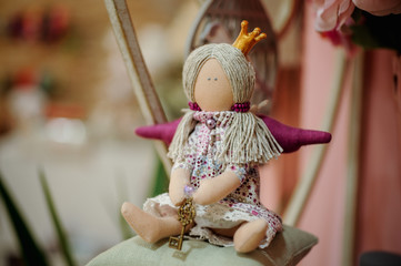 Princess doll with textile and sewing accessory