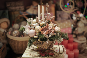 Christmas decoration with candle,fir branches and pine cones.