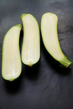 Sectional view zucchini on a black background