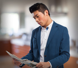 chinese man with newspaper