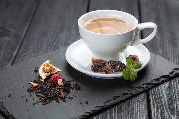 Cup of tea on dark background