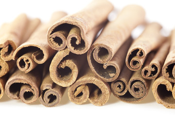 Cinnamon sticks isolated on white background. Close up.