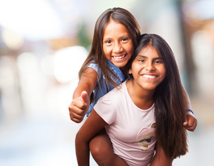 portrait of a cute sisters having fun