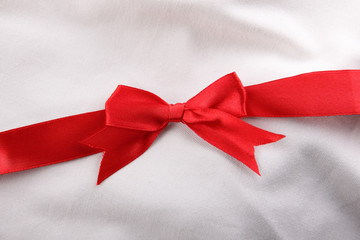 Red ribbon on white
