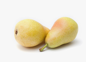 fresh pears are yellow on a white background.