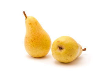 fresh pears are yellow on a white background