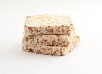 Dietary wheat bread on a white background.ïîèñê