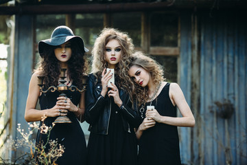 three vintage women as witches