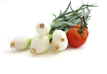 Fresh raw vegetables on a white background