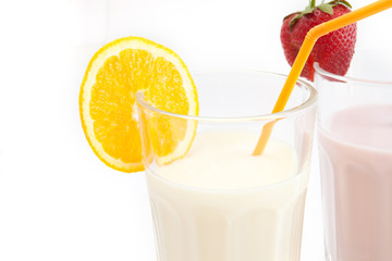 yoghurt drink in a glass beaker on a white background