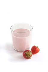 yoghurt drink in a glass beaker on a white background