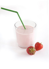 yoghurt drink in a glass beaker on a white background