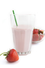 yoghurt drink in a glass beaker on a white background