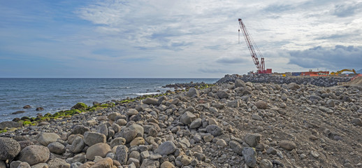 Work in progress in a harbor in summer
