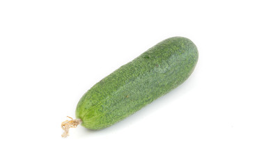 A fresh green cucumber isolated on a white background