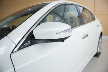 Fototapeta na wymiar side rear-view mirror on a modern car