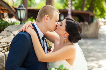 Kissing wedding couple