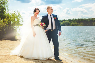 Wedding couple near the river