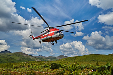 Fototapeta na wymiar Landing of the helicopter to island Vera - Jack London's lake. The Magadan area, Kolyma IMG_0582