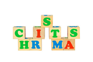 Wood cube with inscription CHRISTMAS 