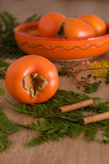 Persimmons and leaves