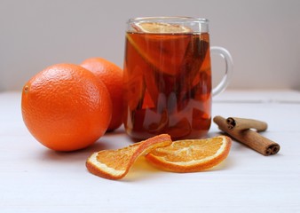 Christmas tea with dried orange and cinnamon sticks