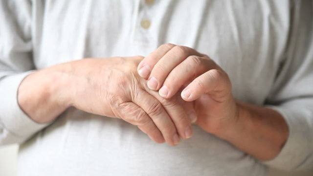 A man experiences pain in his fingers.