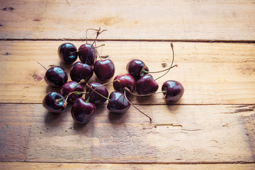 Cherries on wooden