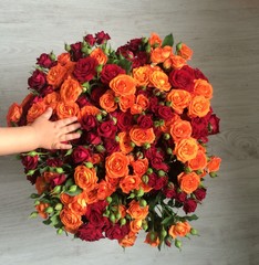 baby hand and flowers