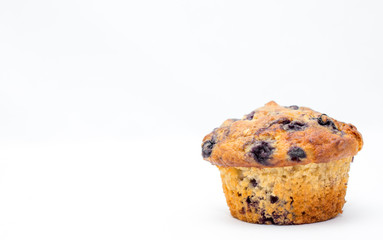 blueberries muffin on a white background 