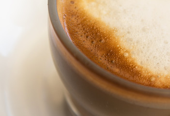 coffee with milk closeup - copy space - cafe latte