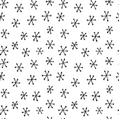 Seamless black and white pattern with hand drawn snowflakes
